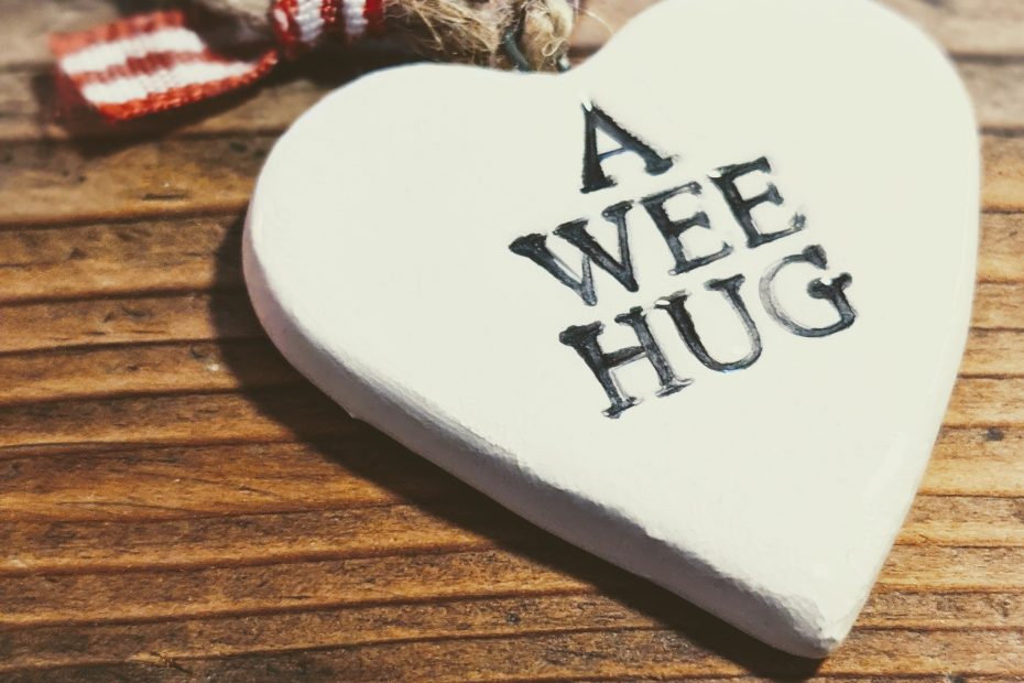 a heart ornament that says "a wee hug"